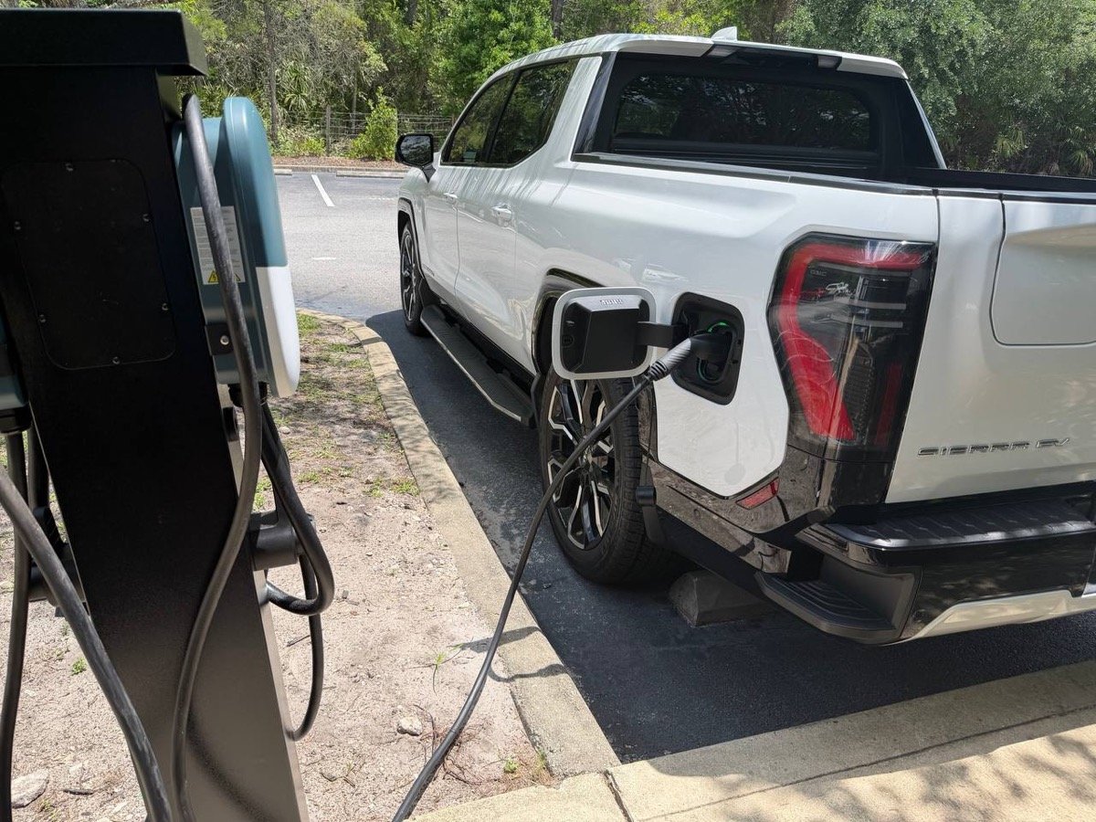 GMC Sierra EV plugged in and charging